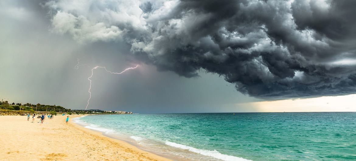 © WMO/Carlos Castillejo Balsera A storm gathers over a beach in Barcelona, Spain.