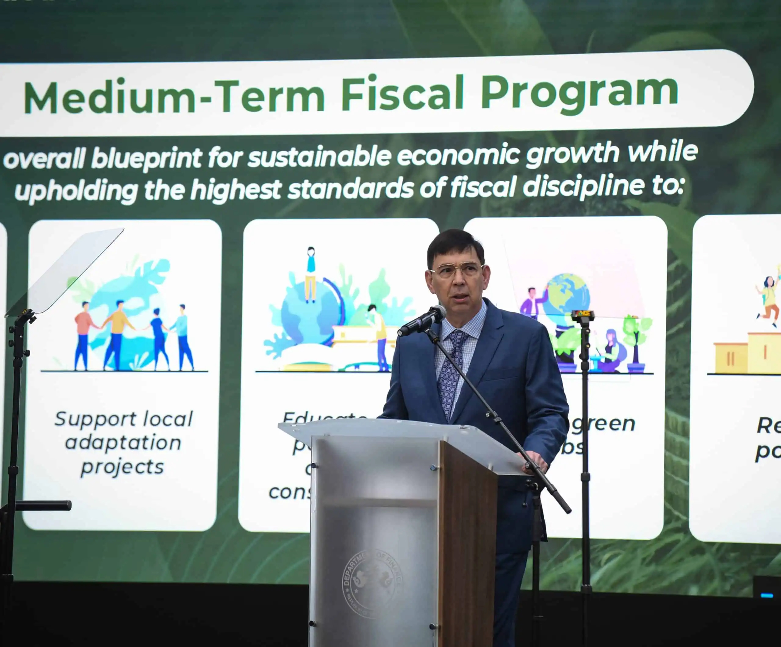 Philippine Finance Secretary Ralph G. Recto speaking at podium during  the Asian Regional Meeting of the Coalition of Finance Ministers for Climate Action