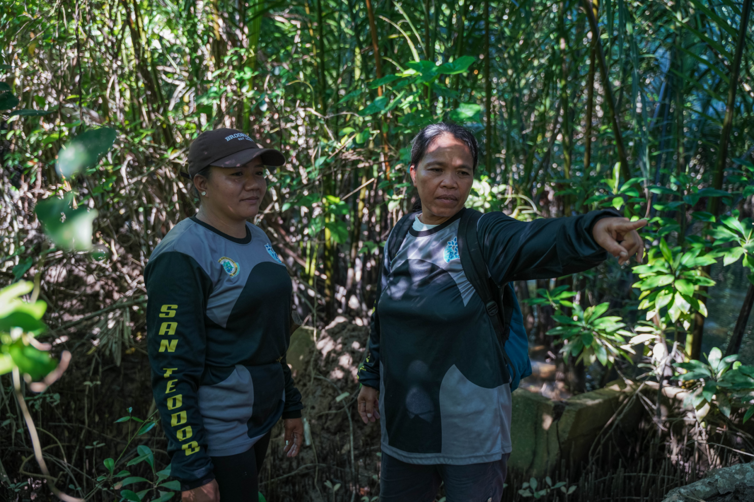  Eliza and Vilma conducting foot patrol in the mangrove forest to check for any signs of illegal logging