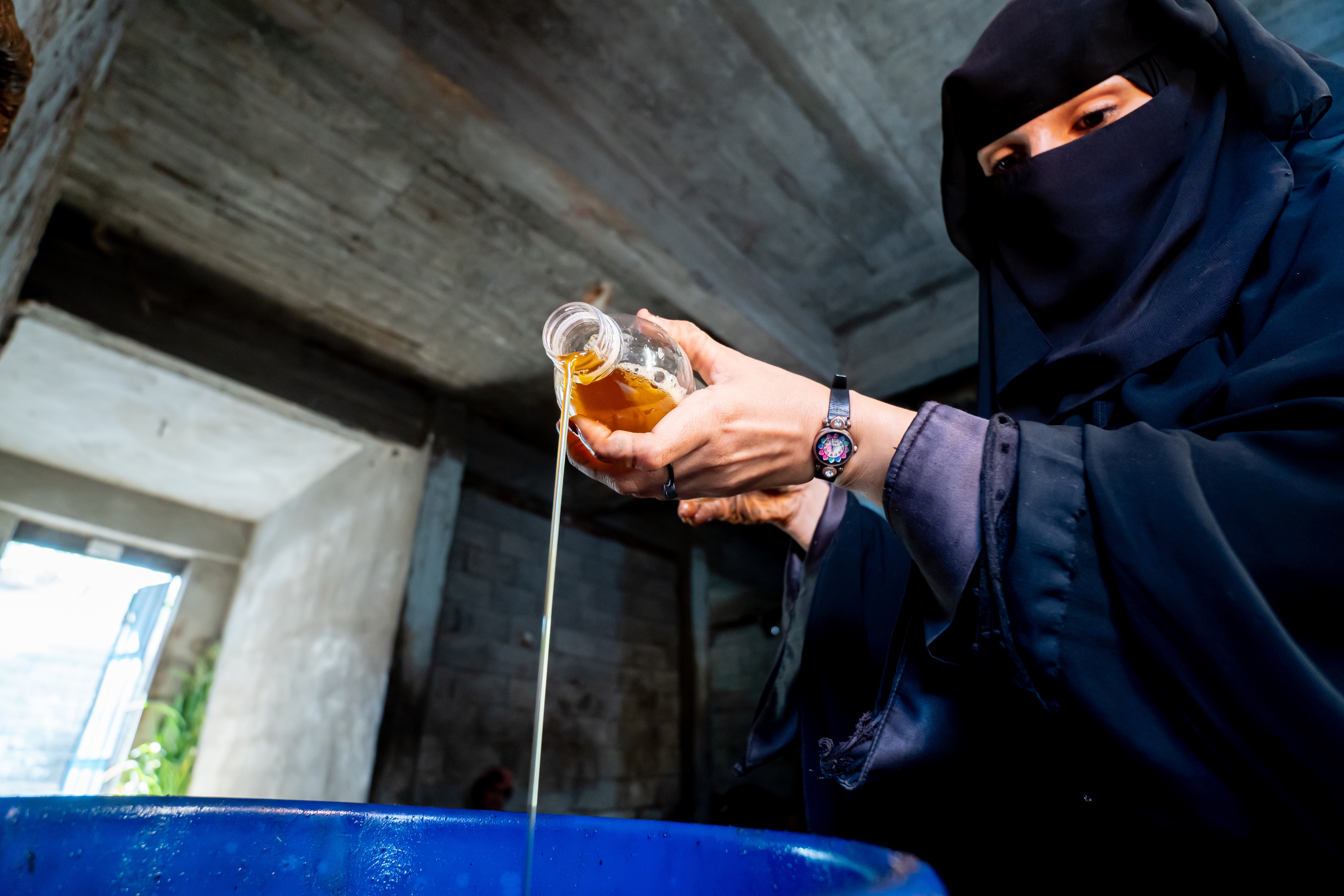Fresh sesame oil from Ashjan's press in Bajel District.