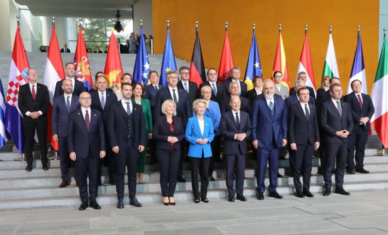Berlin Process Summit 14 October 2024 - group photo on stairs with flags in back