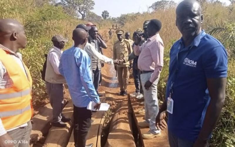 Morobo County officials and IOM staff at the launch of the construction of Supiri Bridge. (Photo: Radio Tamazuj)
